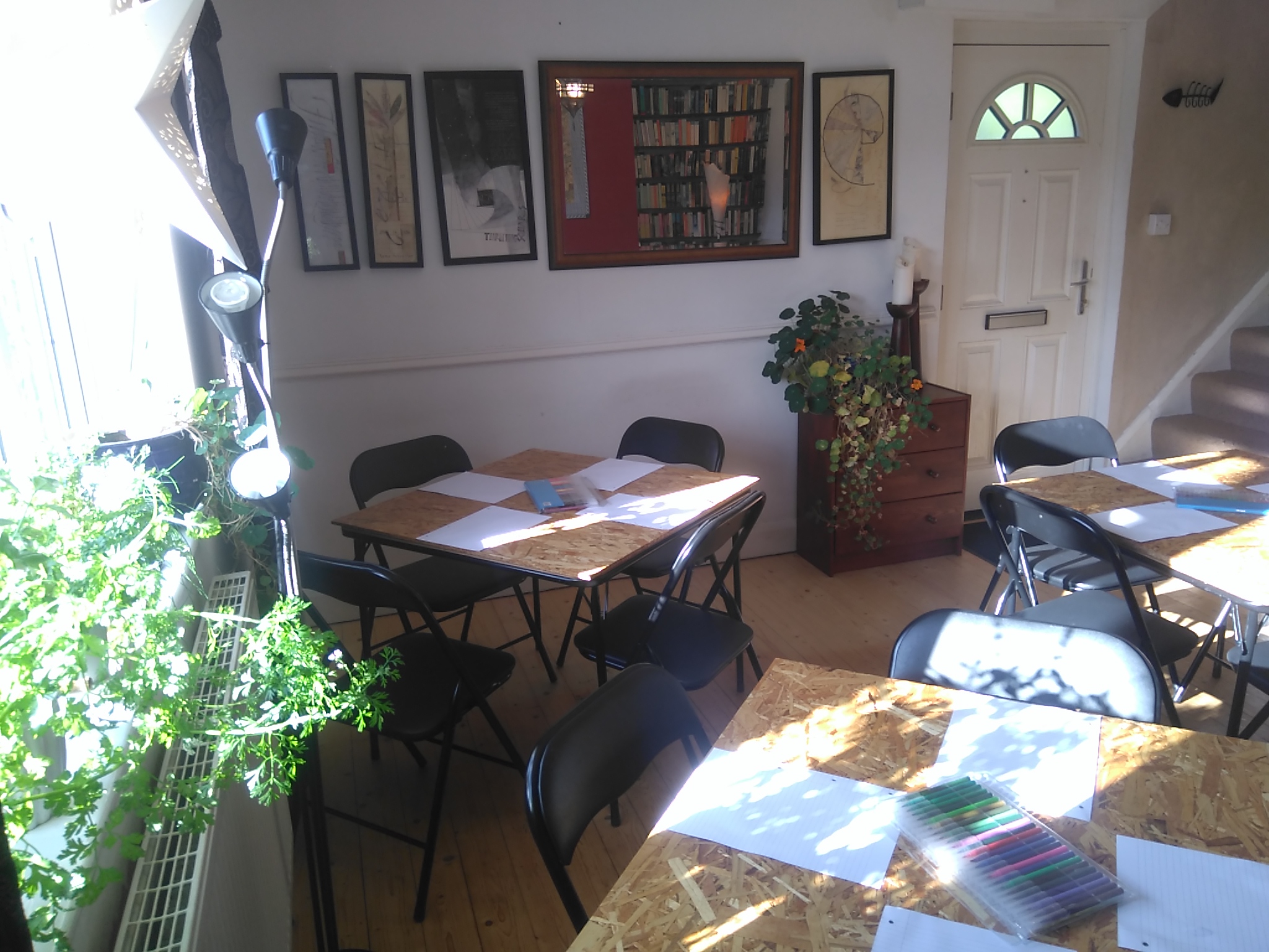 Tables, plants and paintings - the workshop space for summer workshops